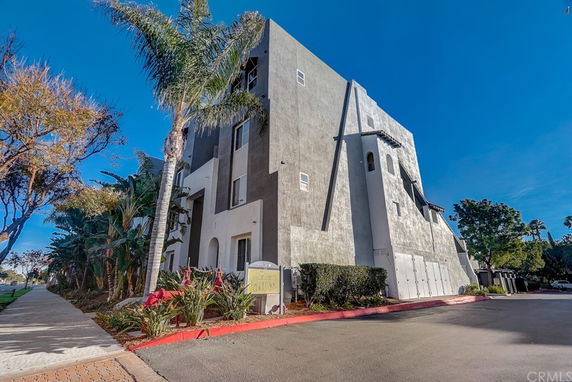 Front view of a multi-story building with a modern design