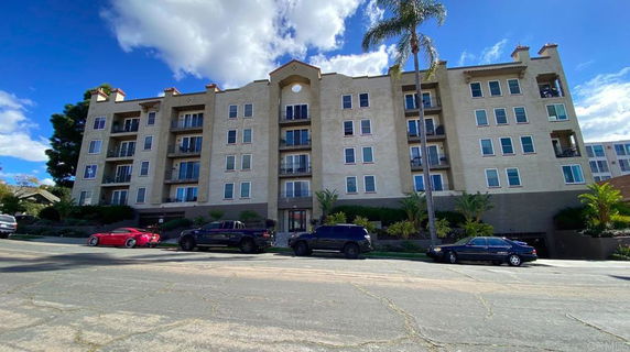 Front view of a multi-story apartment building.