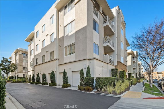 Front view of a multi-story apartment building.