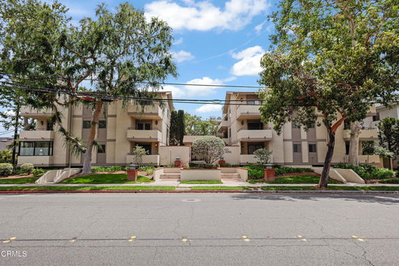 Front view of a multi-story residential building.