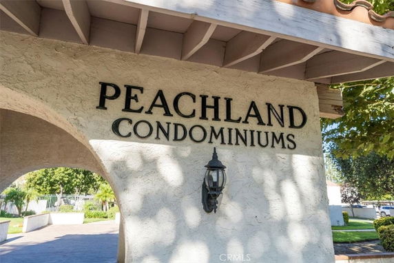 Front view of Peachland Condominiums with signage.