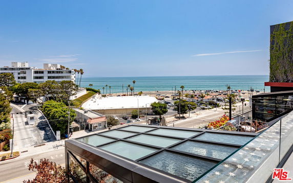 Panoramic view of the coastline and ocean from a building.