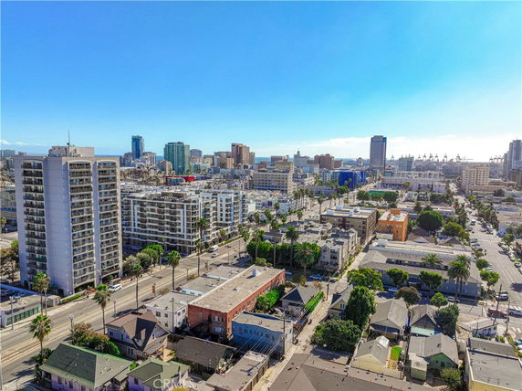 Panoramic view of a cityscape with tall buildings and residential areas.