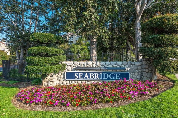 Entrance sign with landscaping for Seabridge community.