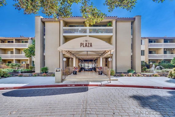 Front view of a multi-story building with a covered entrance labeled 'The Plaza'.