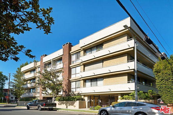 Front view of a multi-story apartment building.