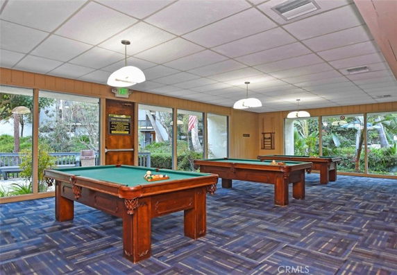 Interior of a recreation room with pool tables.