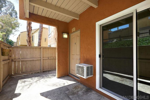 Front view of a house entrance with a small porch area.