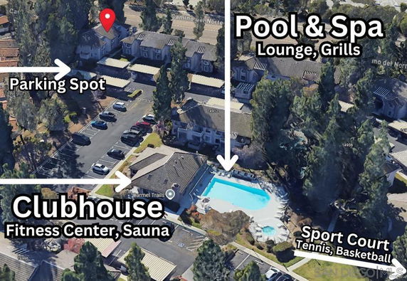 Aerial view showing a residential area with parking, clubhouse, swimming pool, spa, and sport courts.