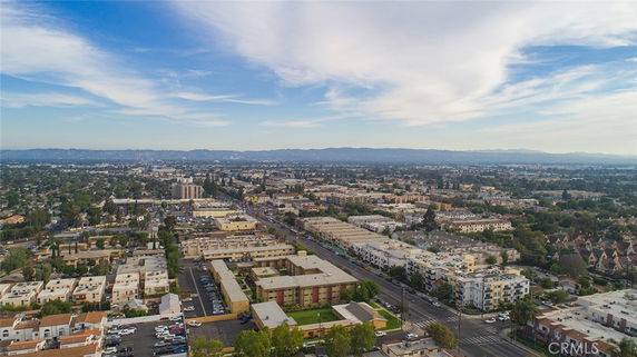 Panoramic view of an urban area with multiple buildings and roads.