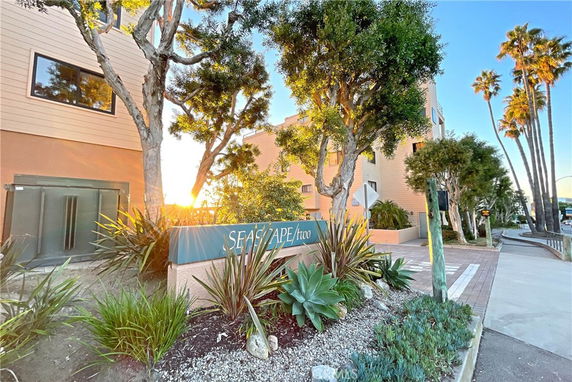 Front view of a multi-story building with a sign labeled 'Seascape Two'.