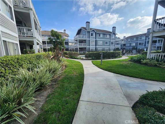Front view of multiple residential buildings with balconies.
