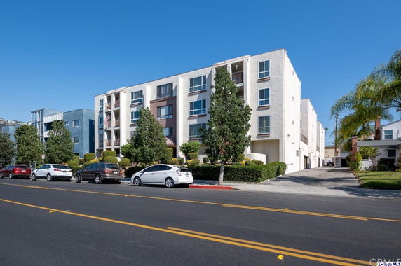 Front view of a multi-story apartment building.