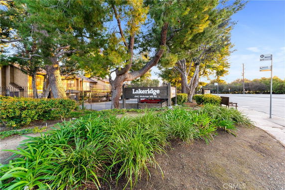 Front view of a building with trees and a sign indicating the name Lakeridge.