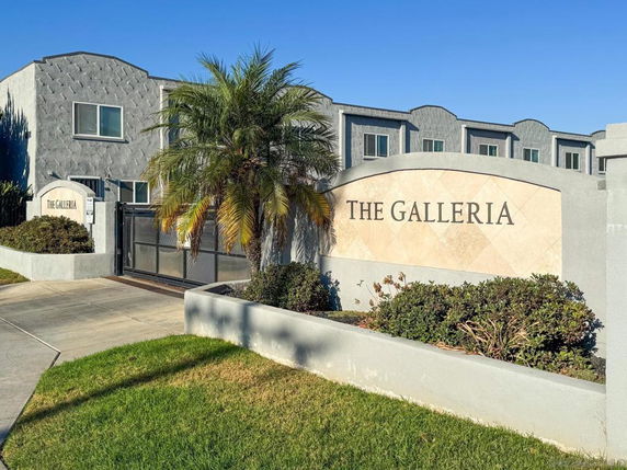 Front view of a building with a sign reading 'The Galleria'.
