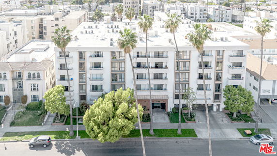 Front view of a multi-story residential building.
