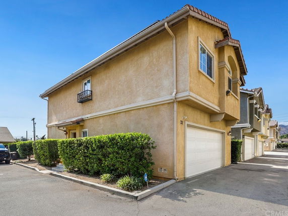 Front view of a two-story house with a double garage.