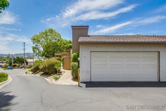 Front view of a house with a double garage.