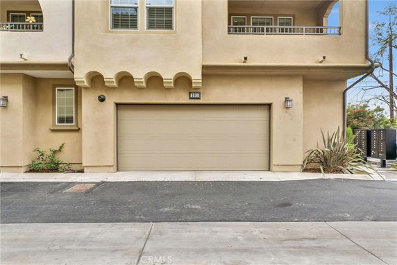 Front view of a building with a double garage.