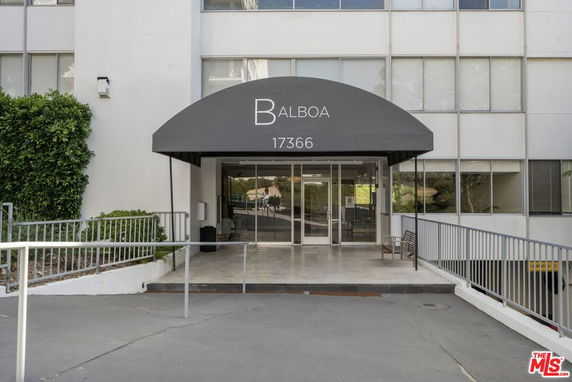 Front view of a building entrance with an awning labeled 'BALBOA.'