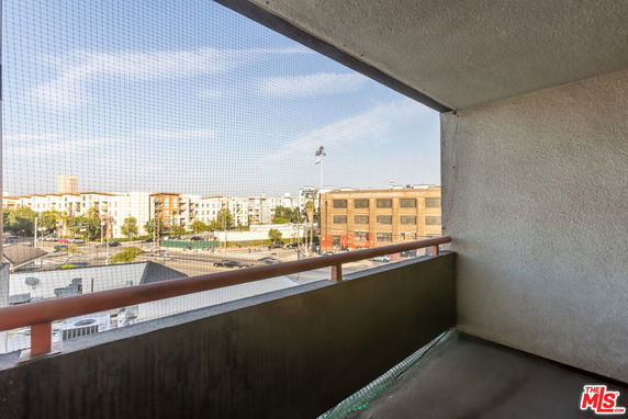 View from a building showing surrounding residential and commercial structures