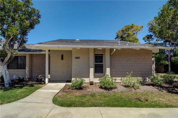 Front view of a single-story house with a covered porch.