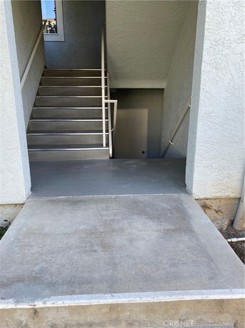 Staircase entrance to a multi-level building.