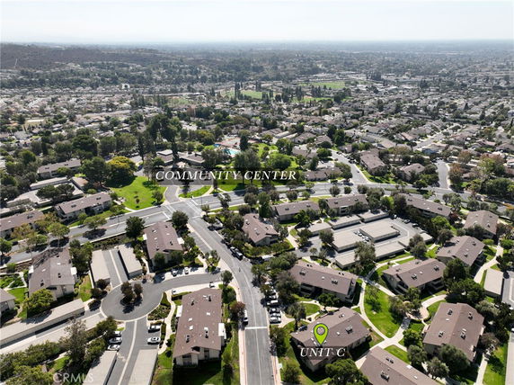 Aerial view of a residential neighborhood with several buildings labeled, including a designated community center.