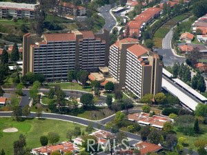 Aerial view of a large, multi-story residential complex with multiple buildings.