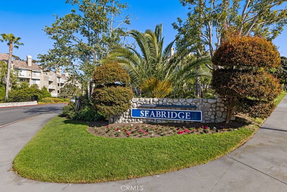 Front view of a residential building with a landscaped entrance and a sign reading 'Seabridge'.