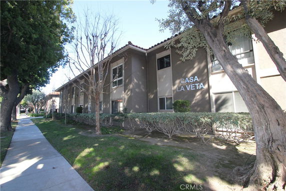 Front view of a two-story building labeled Casa La Veta.