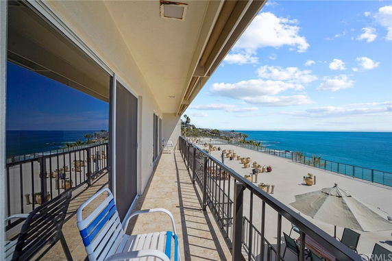 Building balcony with panoramic ocean view.