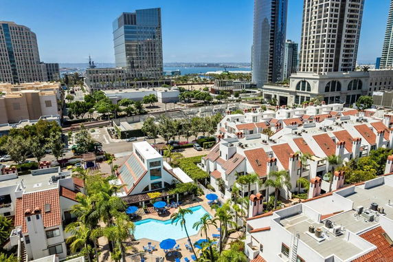 Panoramic view of an urban area with residential buildings and high-rise structures.