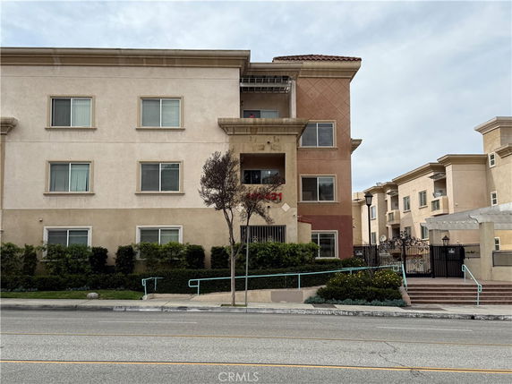 Front view of a multi-story residential building.