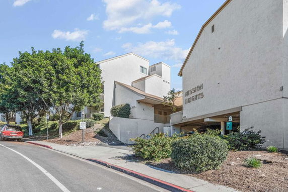 Front view of a multi-story building with the name 'Mission Heights'.