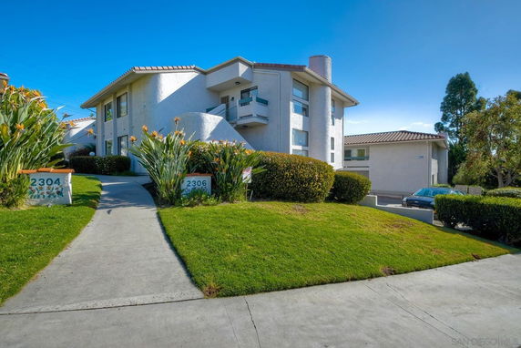 Front view of a multi-story residential building.