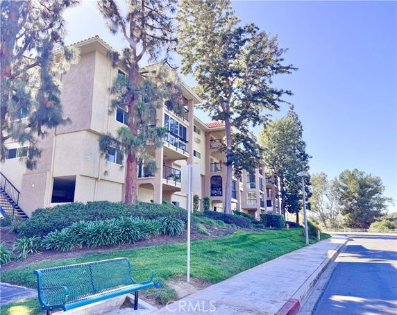 Front view of a multi-story apartment building.