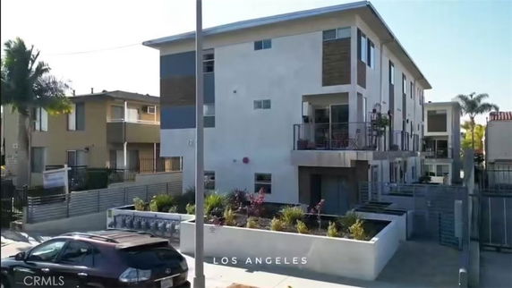 Front view of a multi-story apartment building.