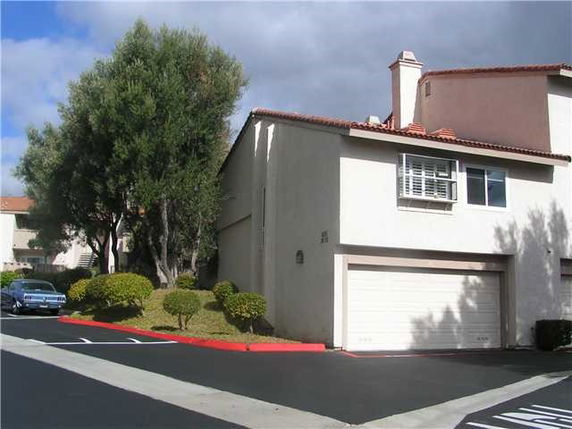 Front view of a two-story house with a double garage.