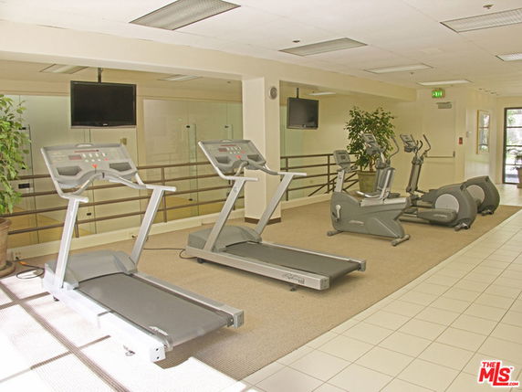 Indoor fitness area with treadmills and exercise equipment