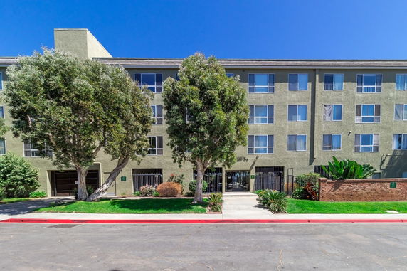 Front view of a multi-story residential building.