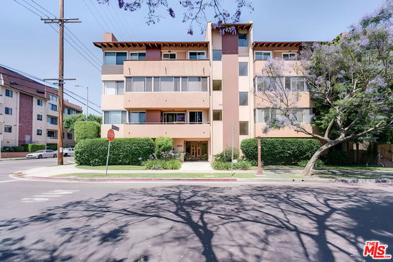 Front view of a multi-story apartment building.