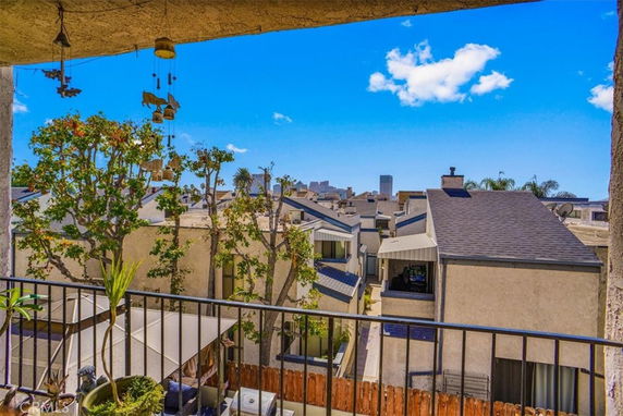View of surrounding residential buildings from a balcony.