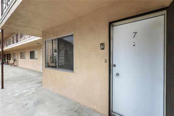 Exterior view of a building entrance with door number 7.