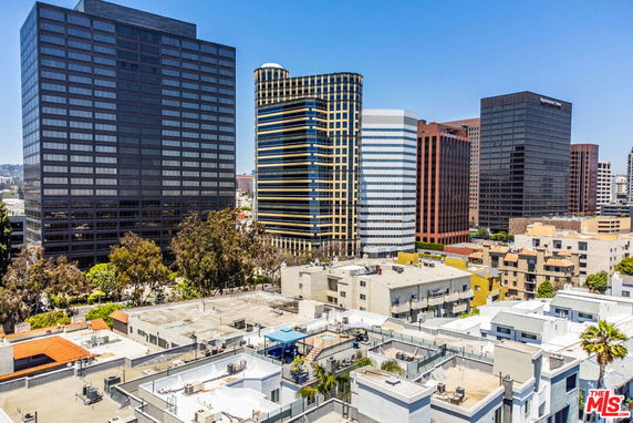 Aerial view of urban buildings with multiple high-rise towers.