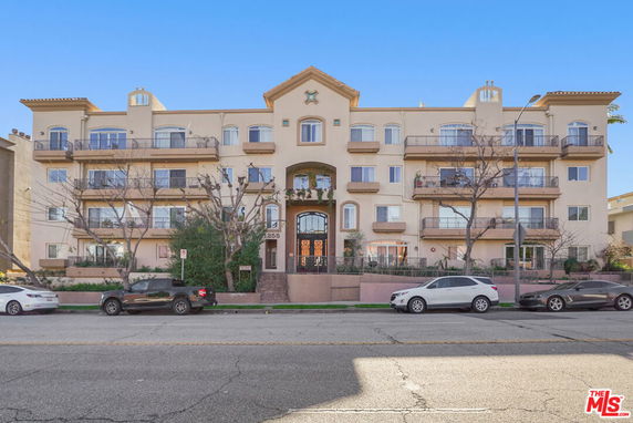 Front view of a multi-story apartment building.