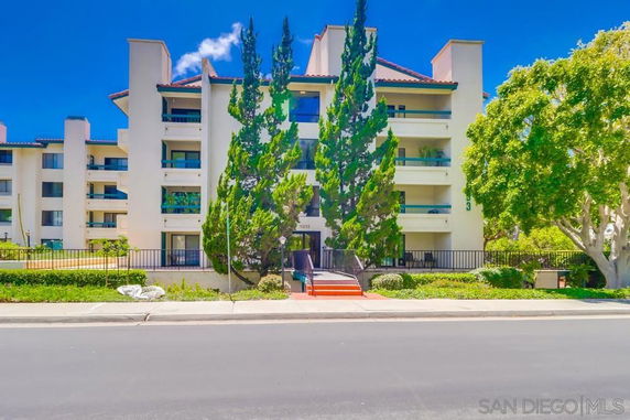 Front view of a multi-story residential building.
