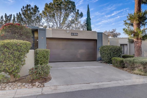 Front view of a house with a garage.