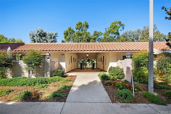 Front view of a single-story house with a tiled roof.