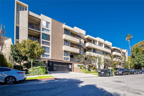 Front view of a multi-story apartment building.